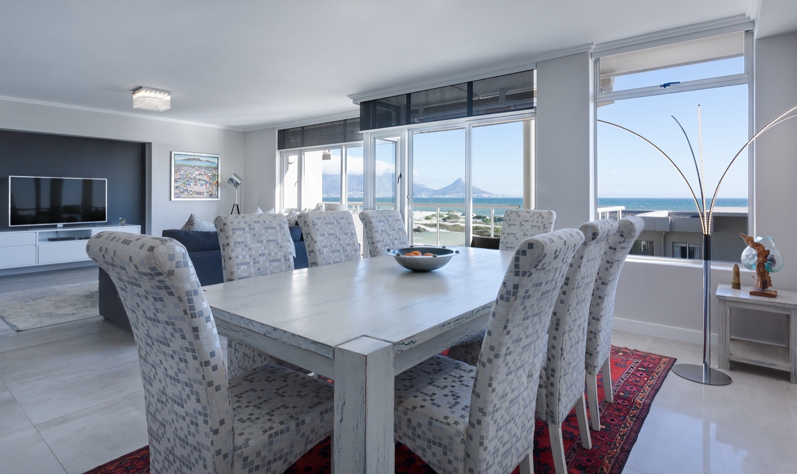 Spotless dining room with set table and clean floors