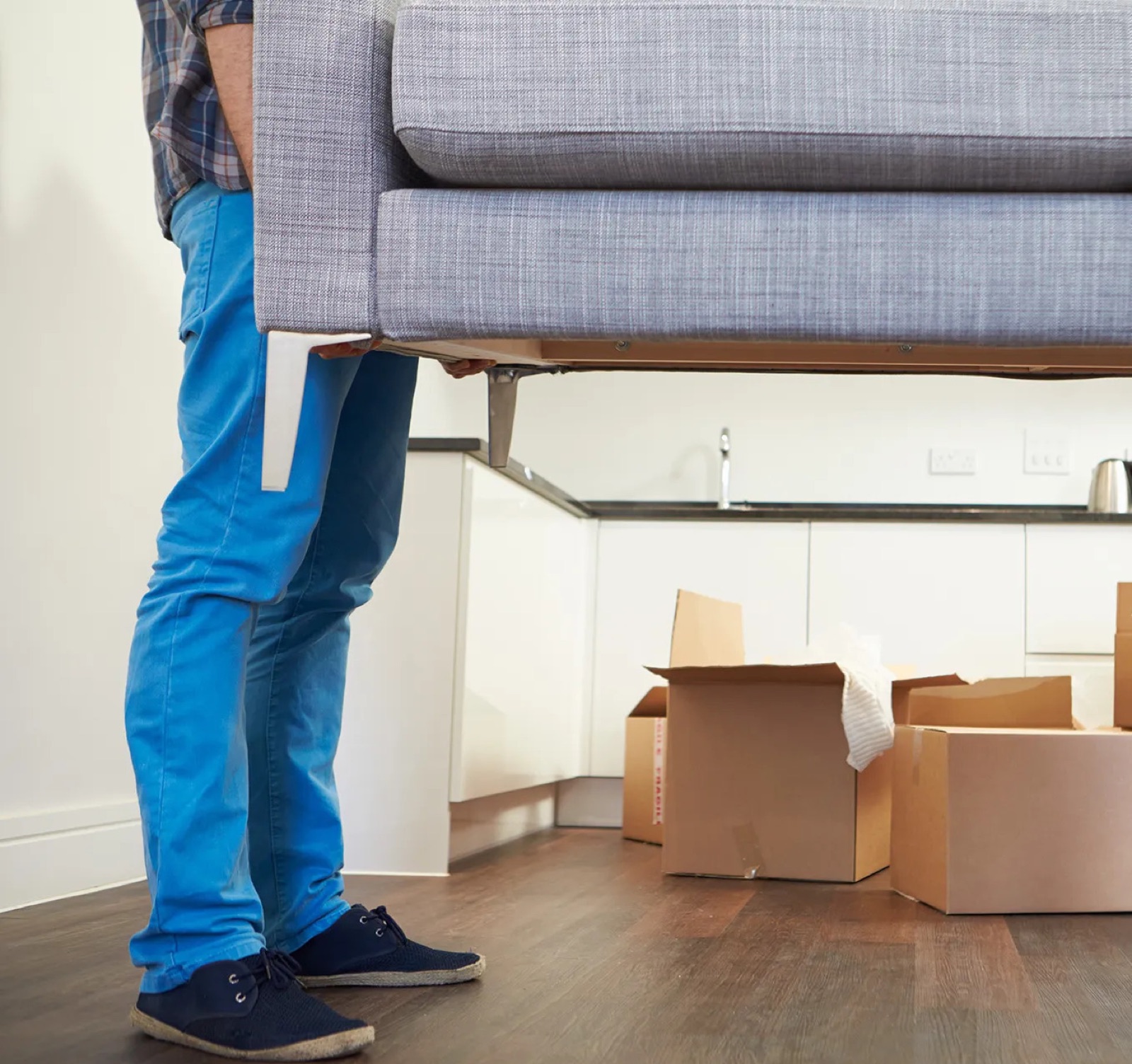 Move in and move out cleaning with boxes and freshly cleaned floors